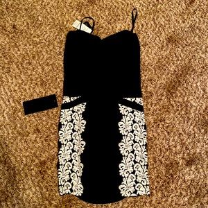 Bebe dress stretch in black and white brand new with tags I strapless